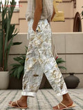 Women's White Bee and Flower Print Drawstring Waist Cropped Pants with Rolled Cuffs and Pockets for Casual Everyday Wear