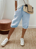 Women's Cropped Pants with Elastic Waistband, Diagonal Side Pockets, and Faux Drawstring